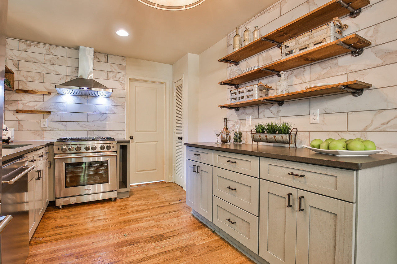 Cabinets by Forevermark Cabinetry, Hardware by Liberty, Appliances by Blomberg, Counters by Hanstone Quartz