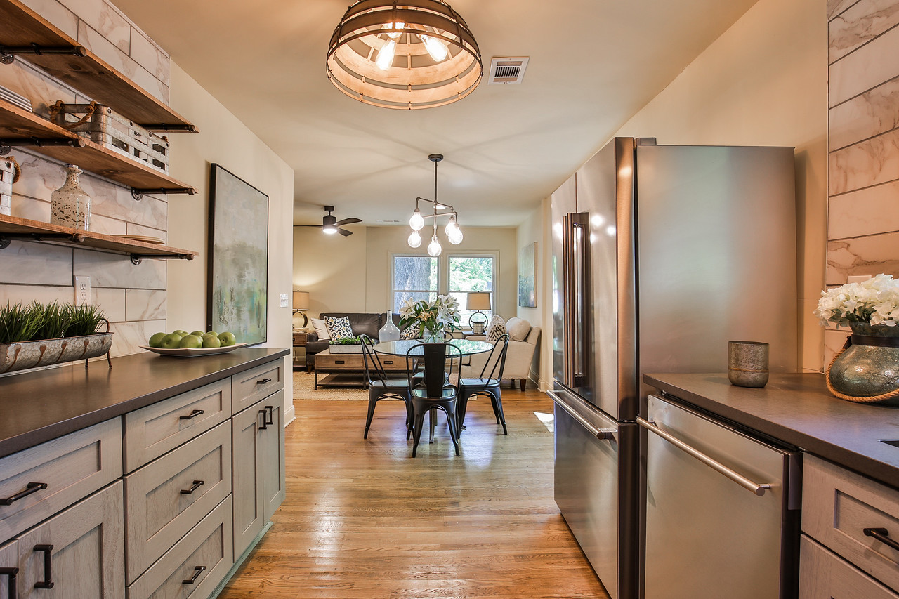Cabinets by Forevermark Cabinetry, Hardware by Liberty, Appliances by Blomberg, Lighting by Savoy House, Counters by HanStone Quartz