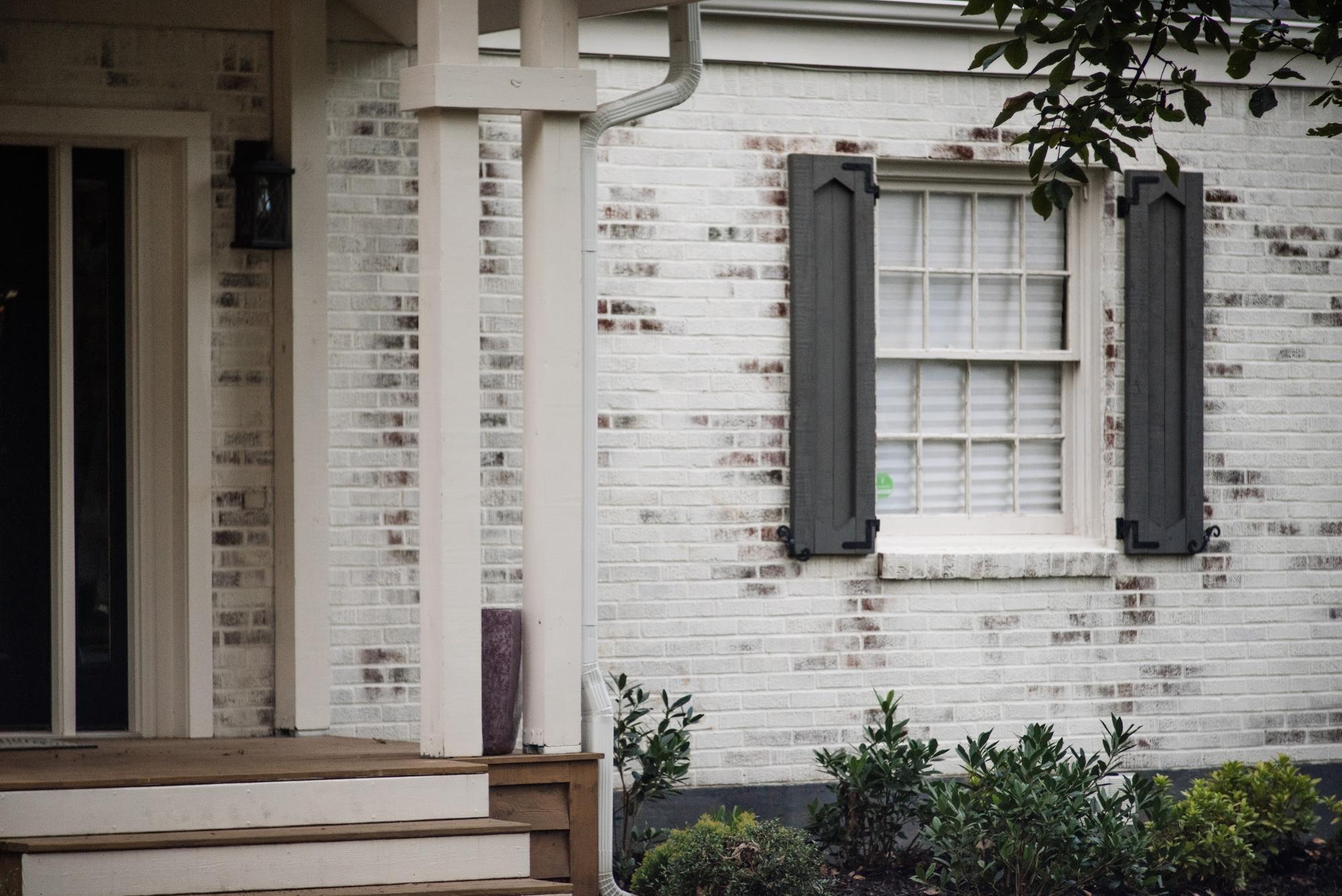 I truly love the look of this limewash. Shown in Avorio White on this house, looks so elegant and clean. Custom shutters by REDBaRN Homes, Lighting by Savoy House